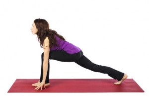 Woman in High Lunge Pose in Yoga